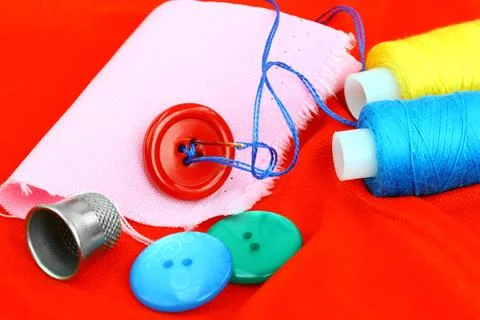 Spools of thread, needles Stock Photos