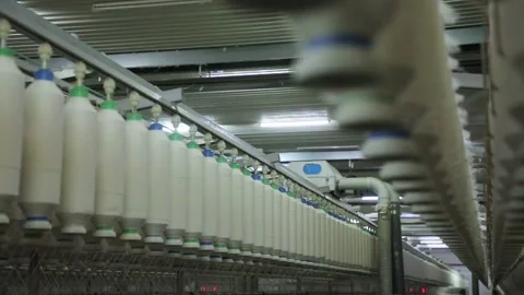 Spools of thread in a row Stock Footage 229946464