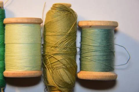 Spools of thread for sewing clothes close-up Stock Photos