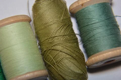 Spools of thread for sewing clothes close-up Stock Photos