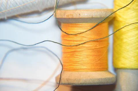 Spools of thread for sewing clothes close-up Stock Photos
