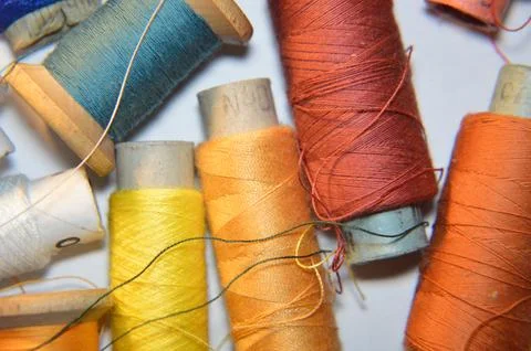 Spools of thread for sewing clothes close-up Stock Photos