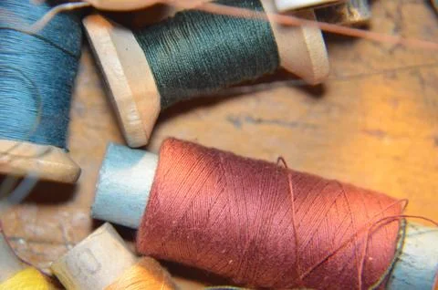 Spools of thread for sewing clothes close-up Stock Photos