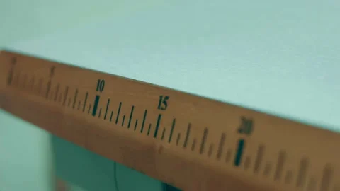 Spools of thread for sewing shoes in dark colors stand on a shelf Stock Footage 232616145