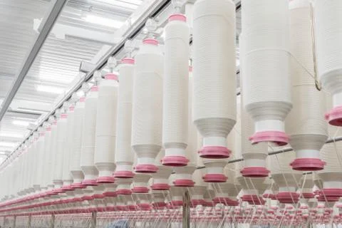 Spools of thread at a textile factory Stock Photos