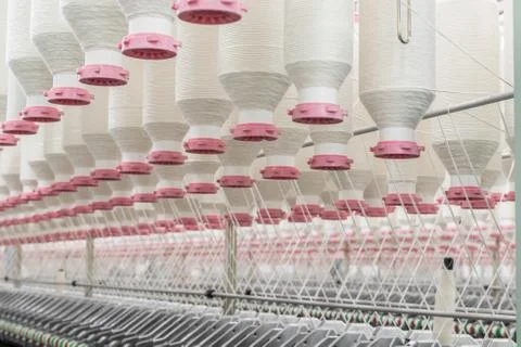 Spools of thread at a textile factory Stock Photos