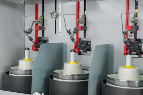 Spools of thread at a textile factory Stock Photos