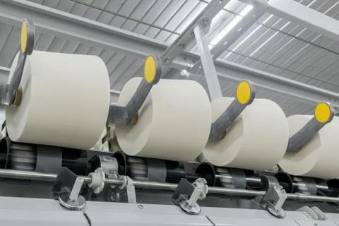 Spools of thread at a textile factory Stock Photos