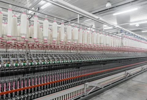 Spools of thread at a textile factory Stock Photos