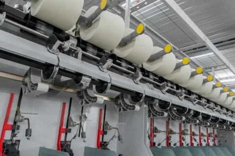 Spools of thread at a textile factory Stock Photos