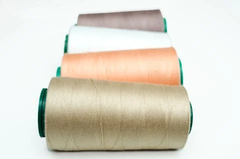 Spools of thread various color on a white background Stock Photos