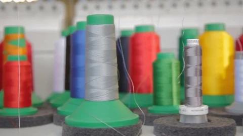 Spools of threads in sewing factory Stock Footage 69855465