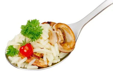 Spoom of boiled rice (risotto) Stock Photos