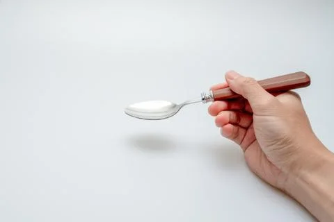 Spoon and chopsticks concept Stock Photos
