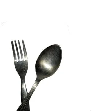 Spoon and fork isolated on white background Stock Photos