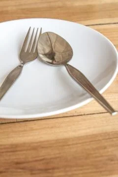 Spoon and fork Stock Photos