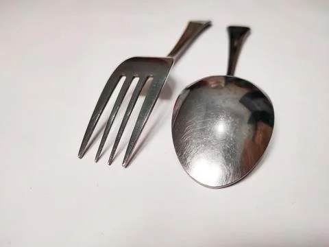 Spoon and fork Stock Photos