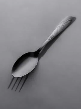 Spoon And Fork With Shadow Minimal Black And White Concept Foto stock