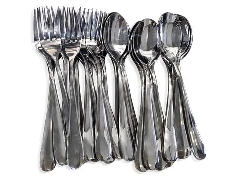 Spoon and fork on a white background Stock Photos