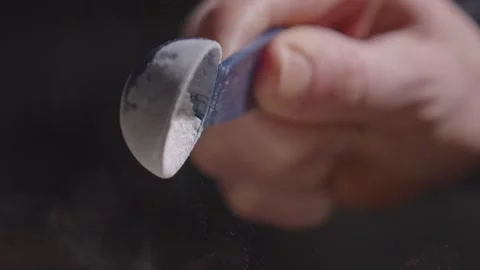 Spoon baking powder falling Stock Footage 149944933