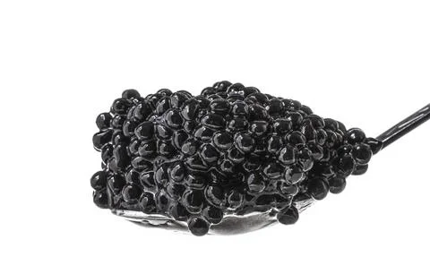 Spoon with black caviar Stock Photos