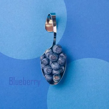 Spoon with blueberries Stock Photos