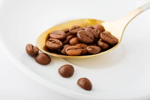 Spoon with coffee Stock Photos