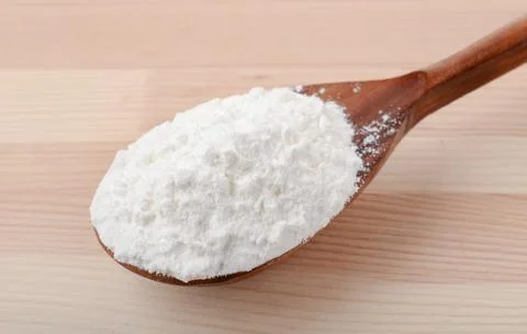 Spoon of corn starch Stock Photos