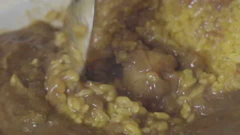 Spoon curry mixed with rice. Stock Footage 85739019