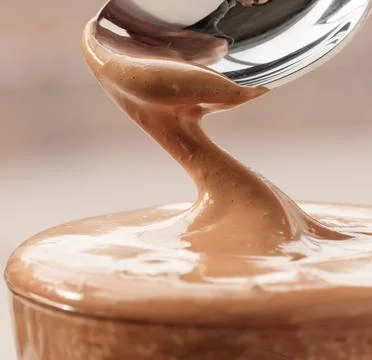 Spoon with dalgona coffee Stock Photos