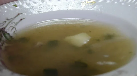 Spoon in a dish with fish soup Stock-Footage 37170525