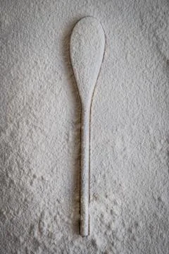 Spoon with flour Stock Photos