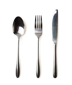 Spoon, fork and knife isolated over white background Stock-Fotos