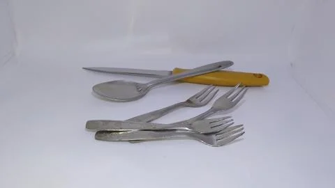 Spoon with fork and knife. Stock Photos