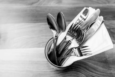 Spoon fork and knife on table view from above. Stock Photos