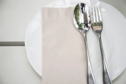Spoon fork with plate setting Stock Photos