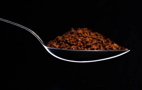 Spoon full of instant coffee Stock Photos