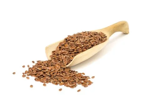 Spoon full of linseed Stock Photos
