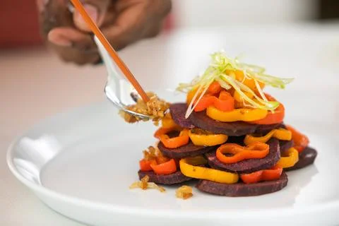 A spoon going in for the first bite Stock Photos