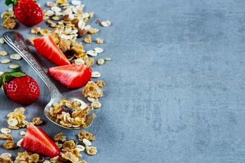 Spoon with granola Stock Photos