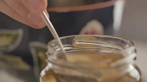 Spoon in a Honey jar 2 스톡 동영상 50617124
