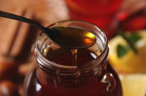 Spoon of honey Stockfoto's
