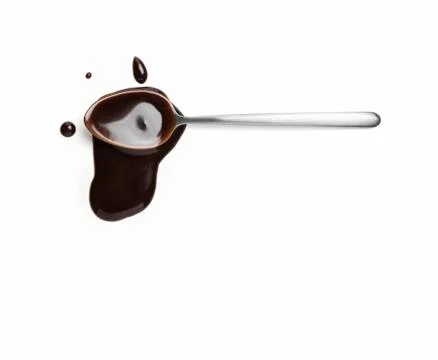 Spoon with liquid chocolate Stock Photos