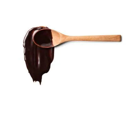 Spoon with liquid chocolate Stock Photos