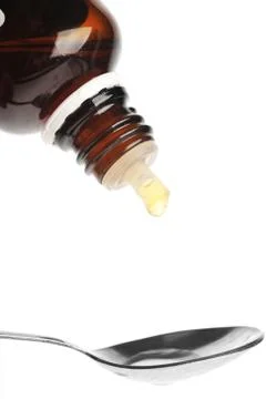 Spoon with medecine Stock Photos
