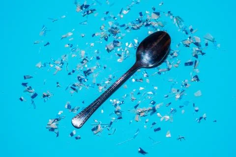 Spoon with microplastics Stock Photos