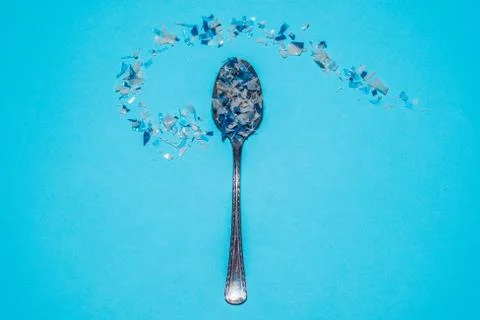 Spoon with microplastics Stock Photos