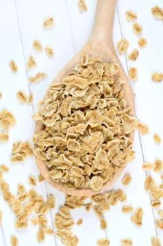 Spoon with oats on table Stock Photos