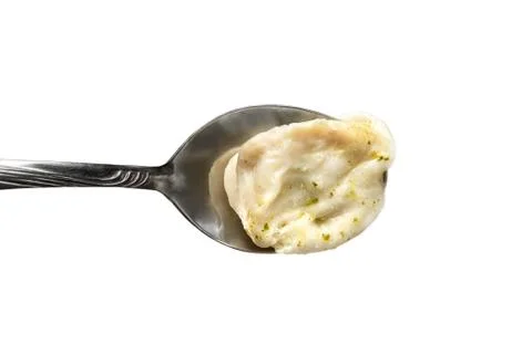On the spoon one ravioli Stock Photos