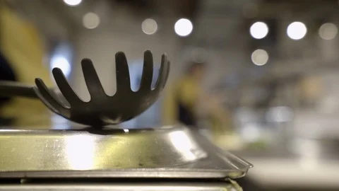 A spoon for pasta in the foreground, Stock Footage 121830998